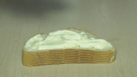 Bread with mayonnaise Stock Footage 83632553