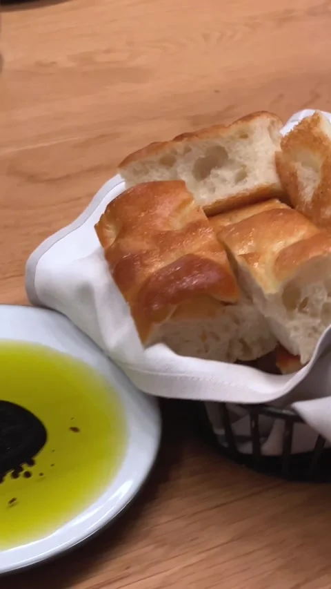Bread meat cheese olive oil homemade baked bread on the table before the meal Stock Footage 293022534