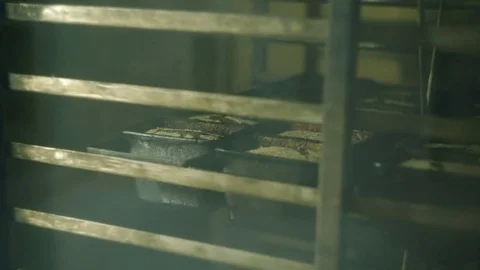 Bread in metal molds Stock Footage 76878884