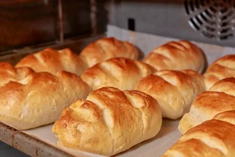 Bread of Milk being baked on a baking tray in the traditional style Stock Photos