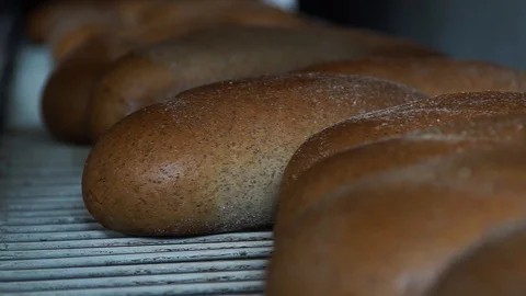 Bread Moving Into Rollers Close Up 2 Stock Footage 90122156