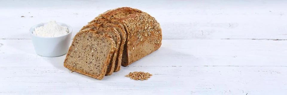 Bread multigrain bread wholemeal bread grain bread cut slice banner text free Stock Photos