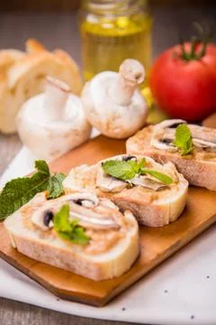 Bread with mushrooms Stock Photos