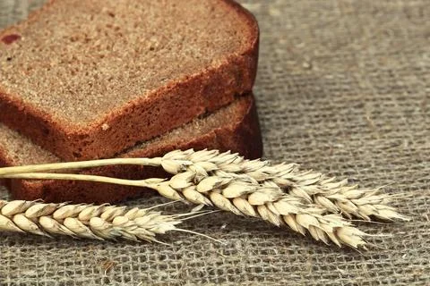 Bread on old background Stock Photos
