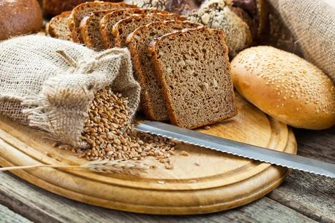 Bread on old background Stock Photos