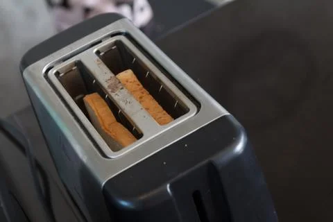 The bread in old Toaster. cooking concept Stock Photos
