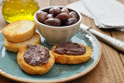 Bread with olive pate Stock Photos