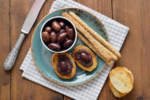 Bread with olive pate Stock Photos