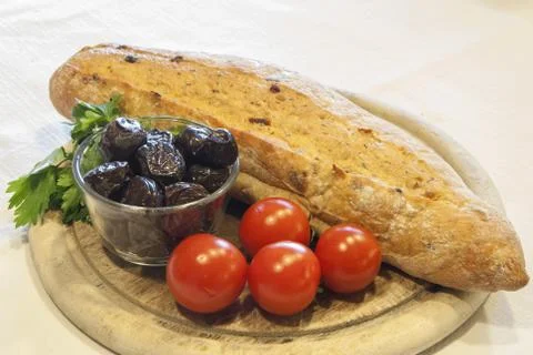 Bread with olives and tomatoes Stock Photos