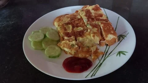 Bread omelette with red tomato sauce and green salad Stock Footage 159459598