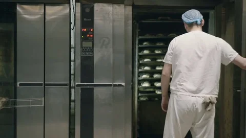 Bread in the oven Stock Footage 76885792