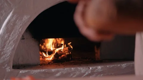 Bread from the oven is put on the table Stock Footage 133079692
