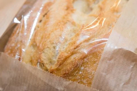 Bread in paper bag Stock Photos