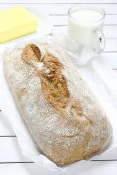 Bread on paper Stock Photos
