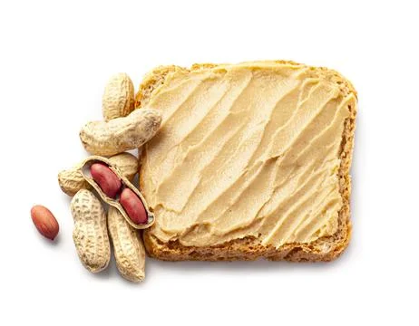 Bread with peanut butter with nuts Stock Photos