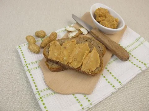 Bread with peanut butter Stock Photos