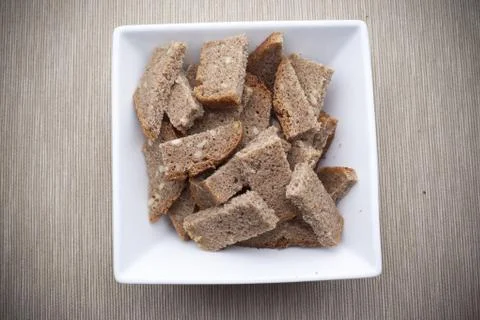 Bread pieces in the bowl Stock Photos