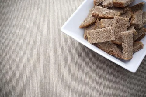 Bread pieces in the bowl Stock Photos