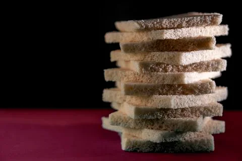 Bread on a pink black background Stock Photos