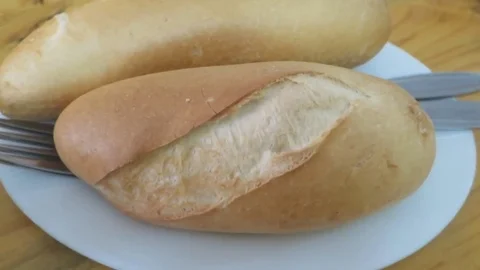 Bread on a plate Stock Footage 70689032