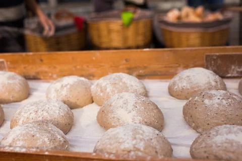 Bread preparation. loaves of dough before baking Stock Photos