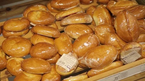 Bread products on a shelf in a bakery Stock Footage 75474945