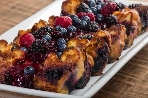 Bread pudding with berry topping Foto stock