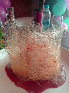 Bread pudding surrounded by candy nest Stock Photos