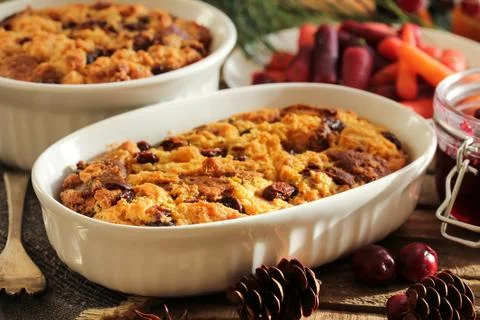 Bread pudding in a white ramekin side view Foto stock