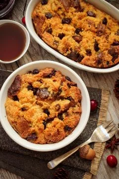 Bread pudding in a white ramekin top view flat lay 스톡 사진