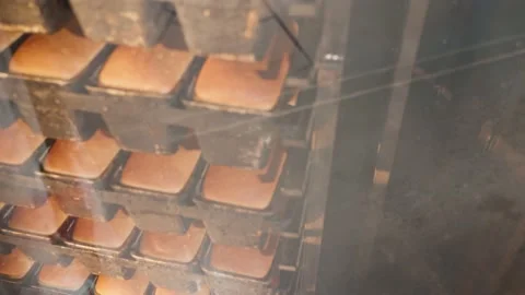The bread rack rotates in the oven. The process of baking bread in the oven. Stock Footage 234730065