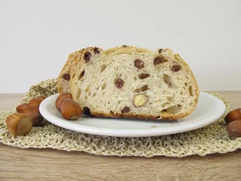 Bread with raisins and hazelnuts Stock Photos
