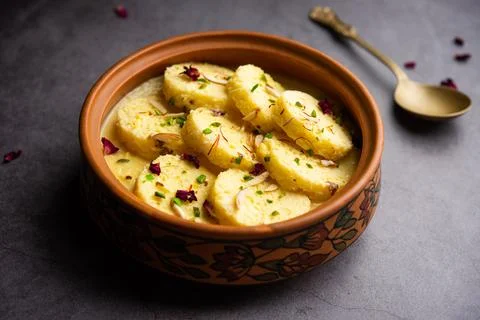 Bread Rasmalai is the tweaked version of traditional Ras malai using bread .. Stock Photos