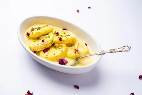 Bread Rasmalai is the tweaked version of traditional Ras malai using bread .. Stock Photos
