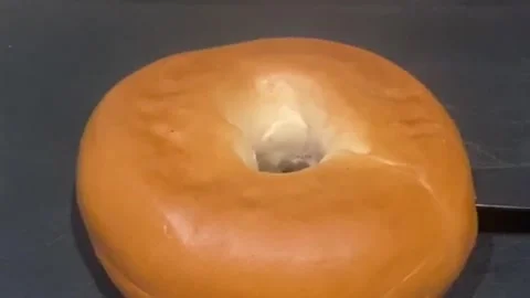 A bread ring or bagel moving into shot 動画素材 148046441