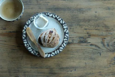Bread roll and butter Stock Photos