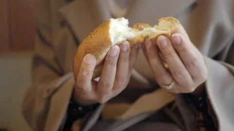 A bread roll being broken apart Stock Footage 321577460