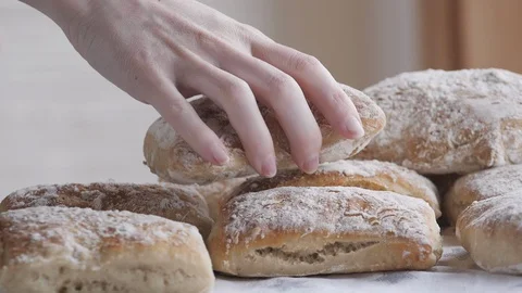 Bread Roll Breakfast - Woman Grabbing Freshly Baked Homemade Bread Stock Footage 129442614