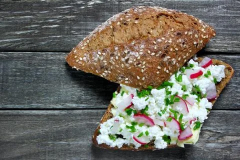 Bread roll with cottage cheese Stock Photos