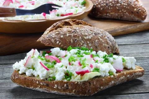 Bread roll with cottage cheese Stock Photos