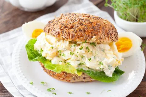 Bread roll with egg salad Stock Photos
