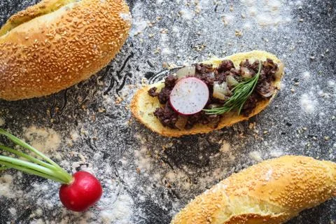 Bread roll with warm kaszanka Stock Photos