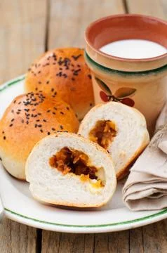 Bread Rolls Filled with Pumpkin and Feta with a Cup of Milk Stock Photos