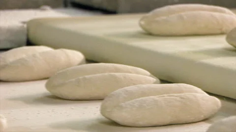 Bread rolls moving on conveyor belt Stock-Footage 67271407