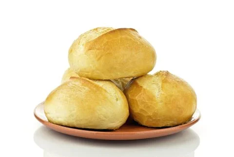 Bread rolls on a plate Stock Photos
