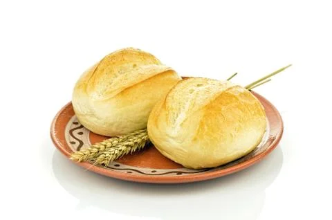 Bread rolls on a plate Stock Photos
