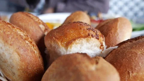 Bread rolls served at a table in a cafe Stock-Footage 342893964