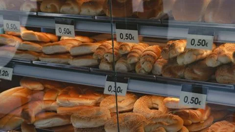 Bread rolls in a shop window Stock Photos