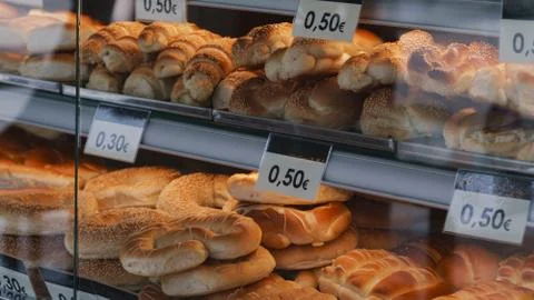 Bread rolls in a shop window Stock Photos