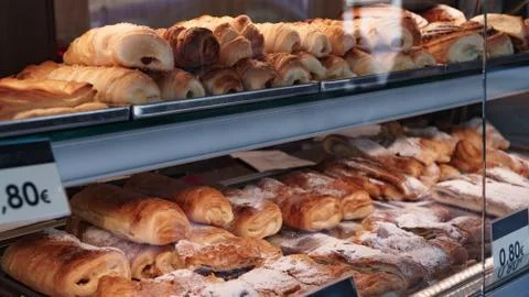 Bread rolls in a shop window Stock Photos
